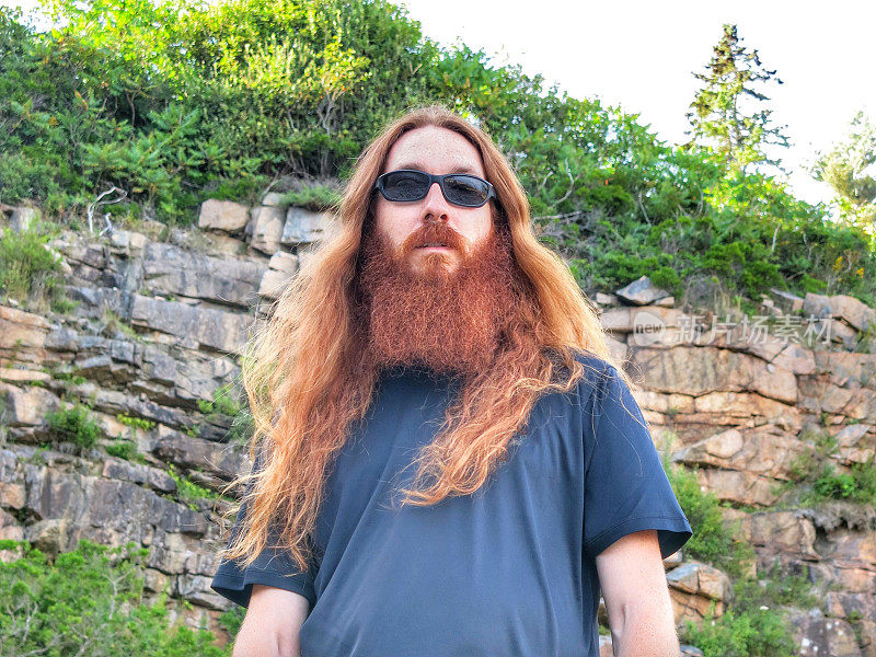 Long Red Hair Rocker Sunglasses Bearded Man Black Shirt Outdoors